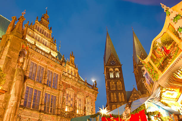 Bremen, Germany: famous old city- hall and x-mas market at dusk.