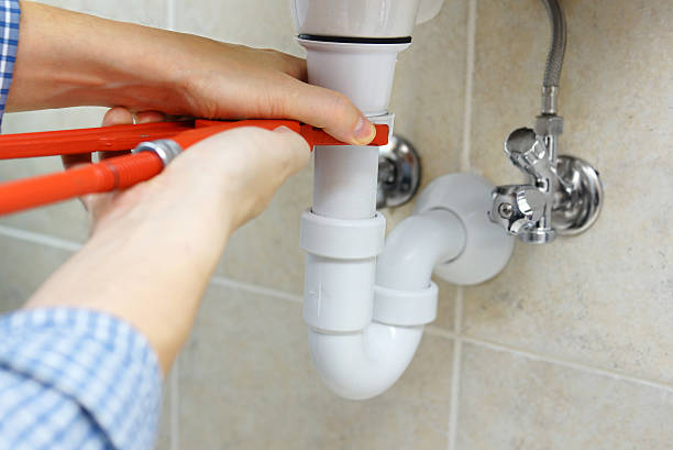istock male plumber fixing flood 477677779