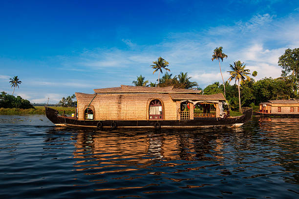 Traditional houseboat from the amazing Kumarakom Lake , Kerala, India.