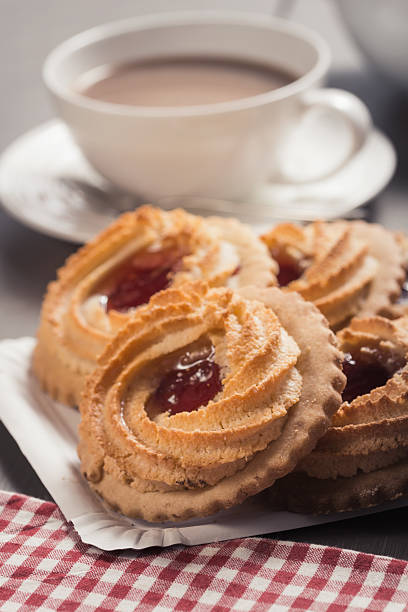 istock German Ox Eye cookies on a laid table 477679211