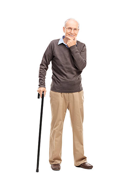 istock Casual senior with a black wooden cane 477679384