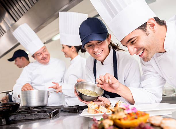 istock Group of chefs cooking 477683747