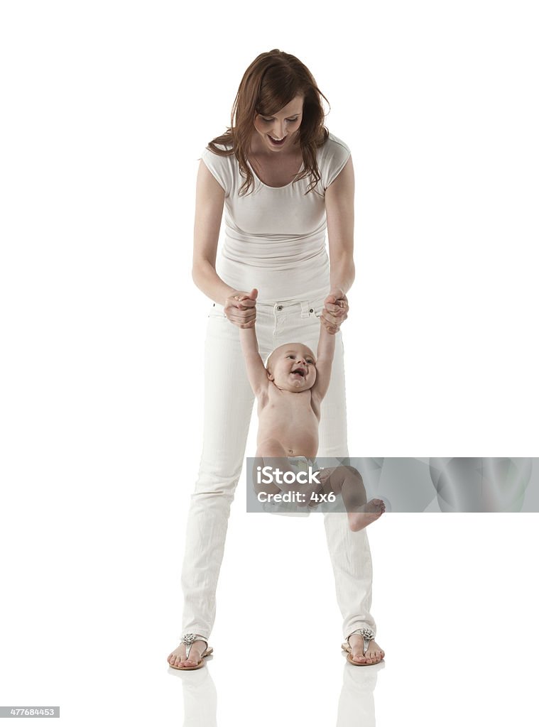 Jovem mãe brincando com seu filho - Foto de stock de 12-23 meses royalty-free