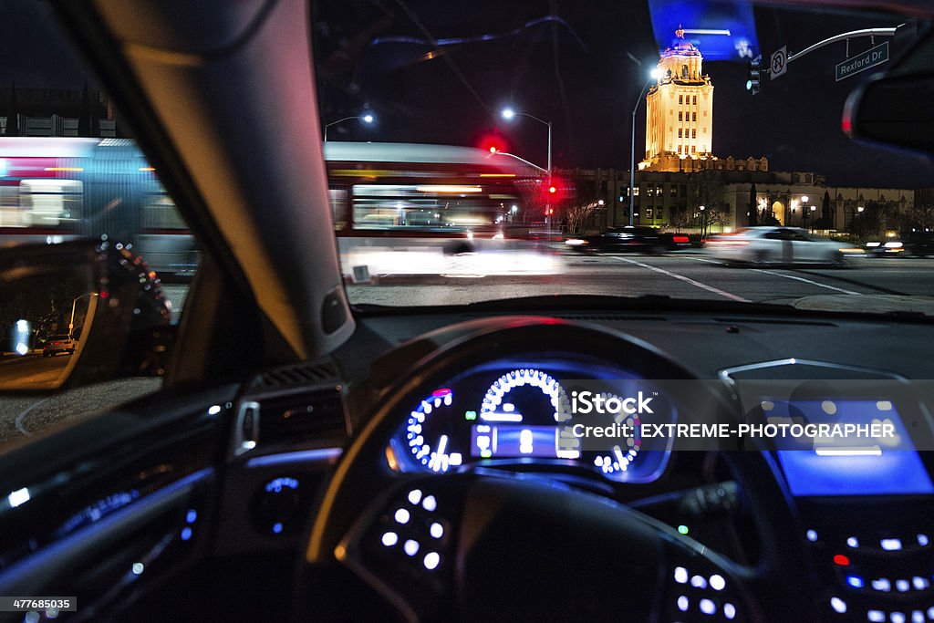 Santa Monica Blvd at night Santa Monica Blvd viewed from a driver seat of a car. LA City Hall can be seen in the background. Car Stock Photo