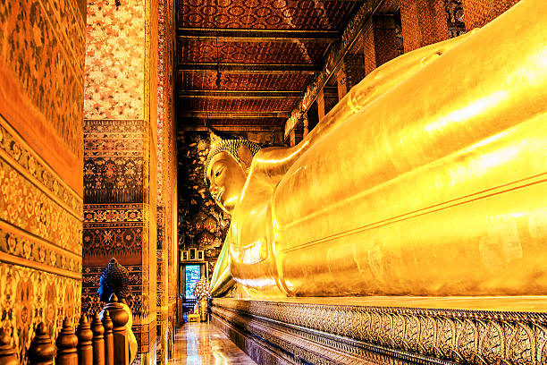 istock Golden Reclining Buddha  , Wat Pho Bangkok Thailand 477685516