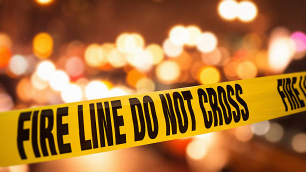 istock fire line cordon tape on the city 477686343