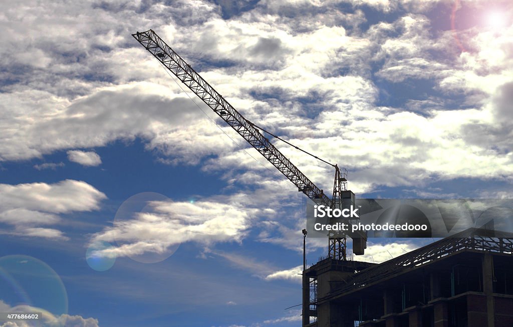 Construction site with cranes on sky background 2015 Stock Photo