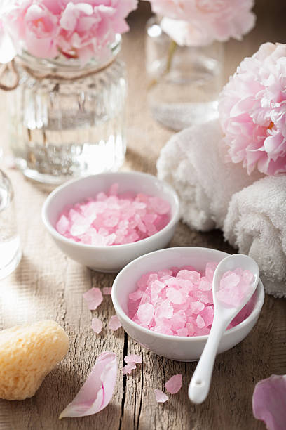 istock spa set with peony flowers and pink herbal salt 477688820