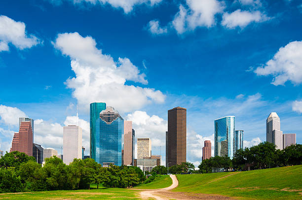 istock Houston downtown skyline with Buffalo Bayou Park and dramatic clouds 477689184