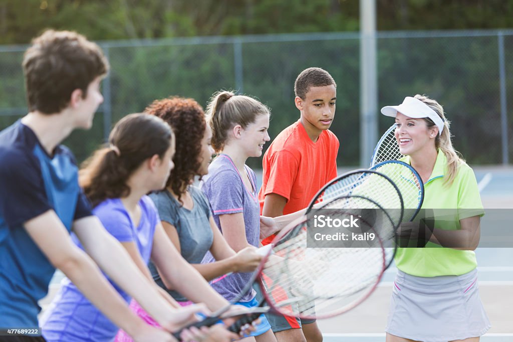 Teenagers at tennis clinic - Royalty-free Tennis Stockfoto