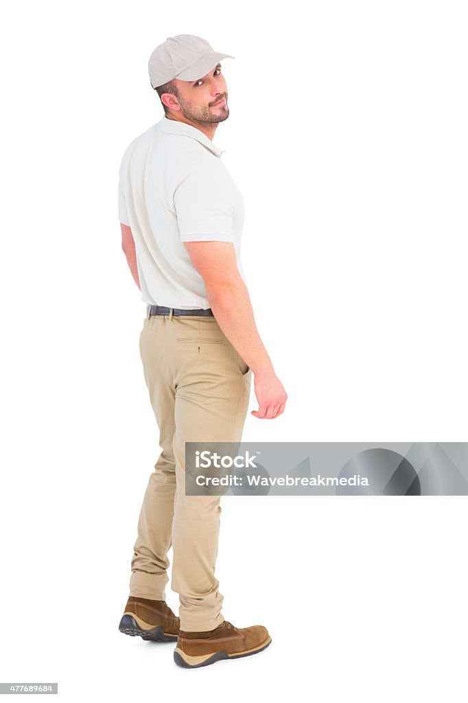 Delivery man wearing cap  Delivery man wearing cap on white background 20-29 Years Stock Photo