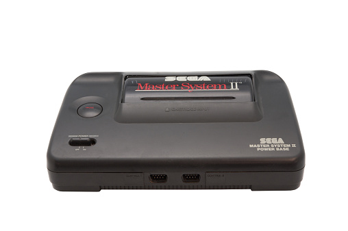 Adelaide, Australia - October 27, 2014: A studio photo of a Sega Master System II console isolated on a white background. Released in the 1980's it was a very popular games console in Europe. 