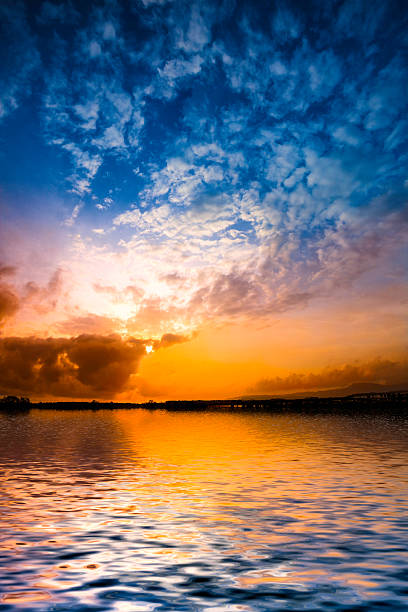 istock Dramatic sky cloudscape on a tropical sea at sunrise 477693317