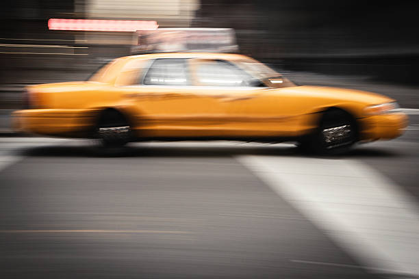 istock taxi running on manhattan 477693949