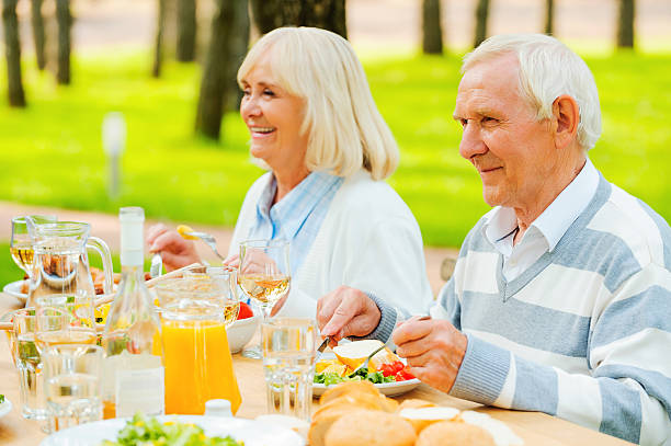 istock Enjoying dinner outdoors. 477695516