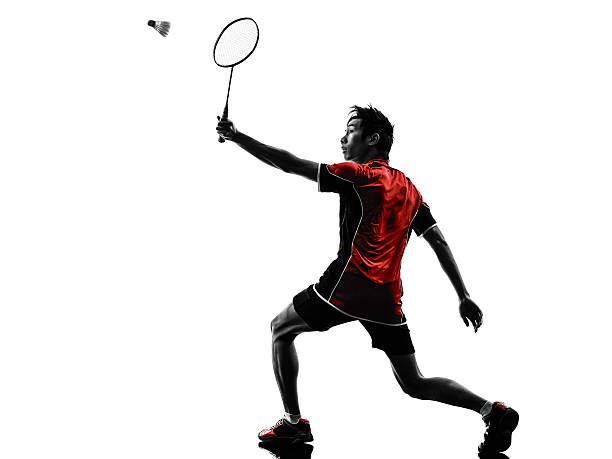 istock badminton player young man silhouette 477695759