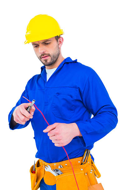 istock Electrician cutting wire with pliers 477696602