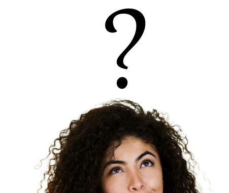 Closeup of a woman with a question mark above her head 