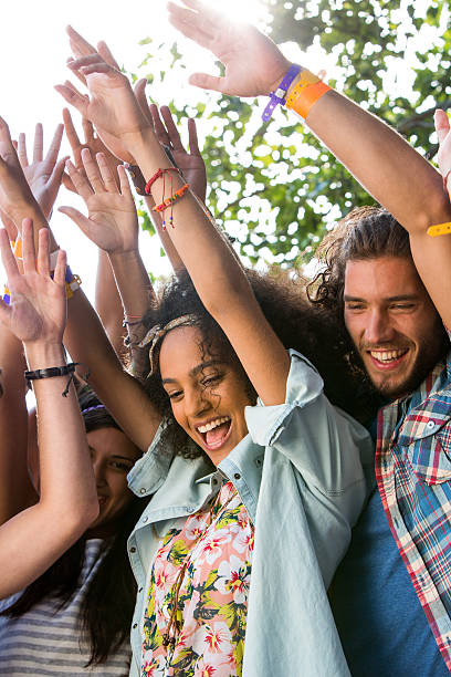 istock Music fans enjoying live music 477700640