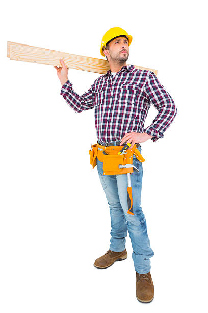 istock Handyman holding wood planks 477700918