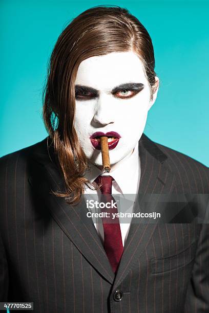 Gothic Vampire Looking Business Man Wearing Black Striped Suit Stock Photo - Download Image Now