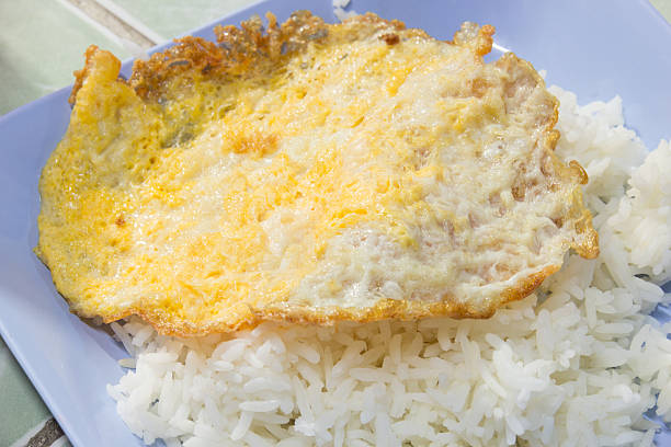 istock fried egg on the rice, fastfood from Thailand 477701814
