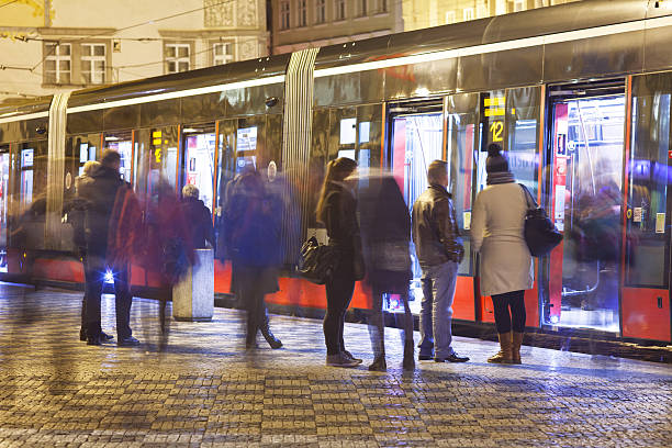 Prague , Czechoslovakia - februar 18, 2014 : People waiting for the bus on a busstation in prague near the charlesbridge. Motion Picture with unsharp people