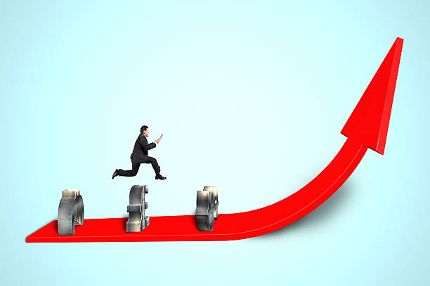 istock jumping over money symbol obstacles on red arrow 477705983