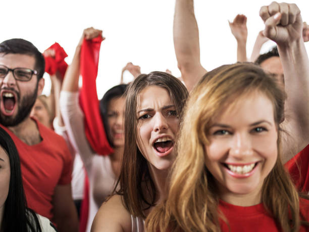istock Sport fans cheering and looking at camera. 477706254