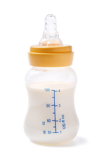 Bottle of milk for baby food isolated on white background