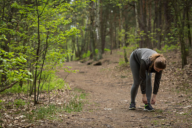 istock Taking rest for tying shoes 477711158