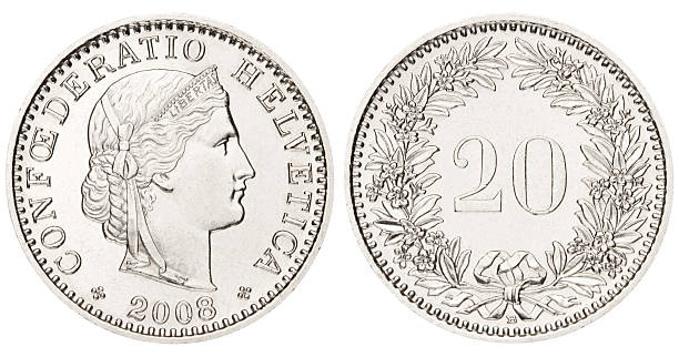 pièce de 20 centimes suisse sur fond blanc - swiss currency coin swiss francs swiss coin photos et images de collection