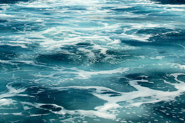 Churning water behind a cruise ship
