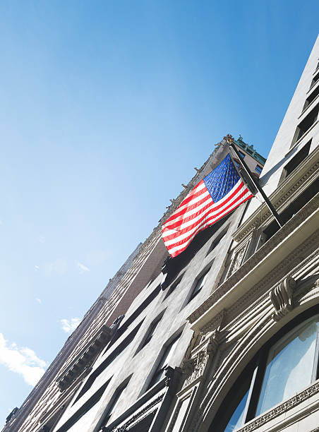istock american flag on manhattan building 477713089