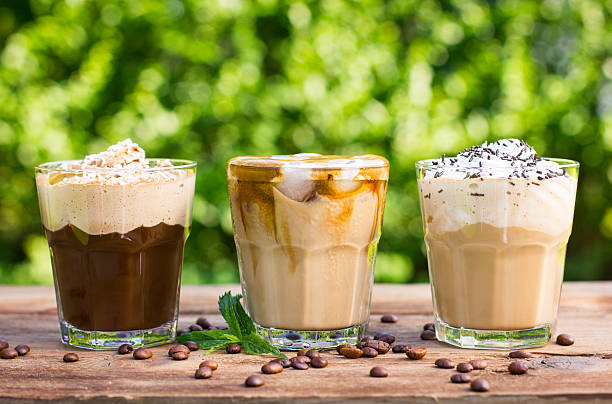 Ice coffee with milk and whipped cream stock photo