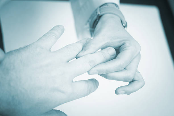 istock Traumatologist orthopedic surgeon doctor examining patient 477713960