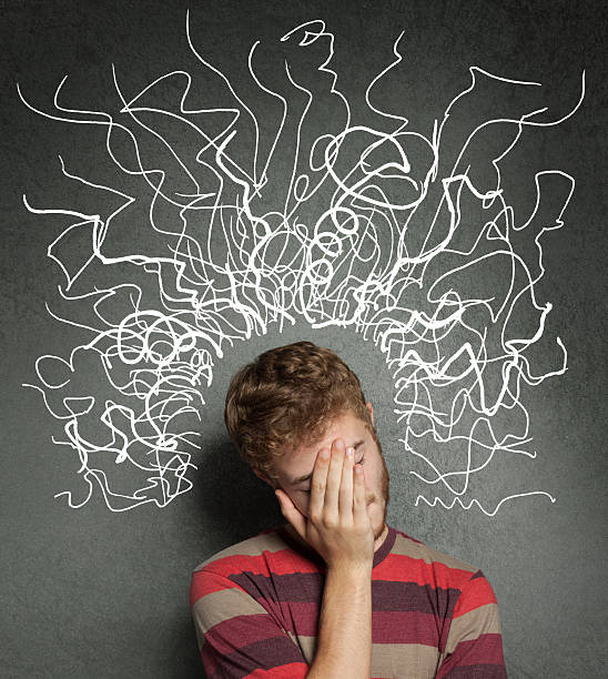 istock confused young man covering his head 477714382