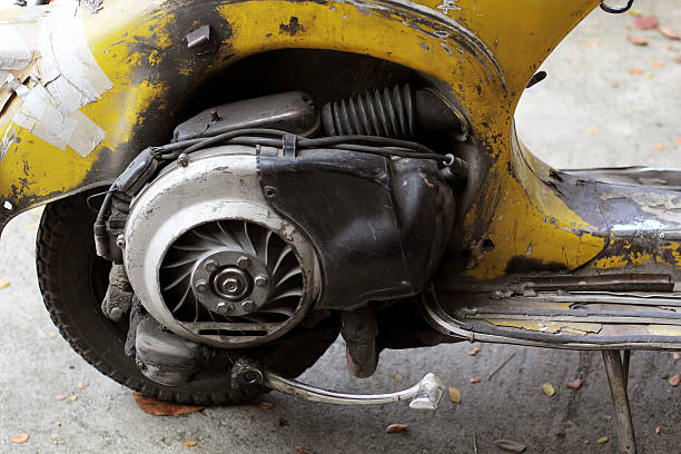 Closeup burnt out motorcycle, background with copy space