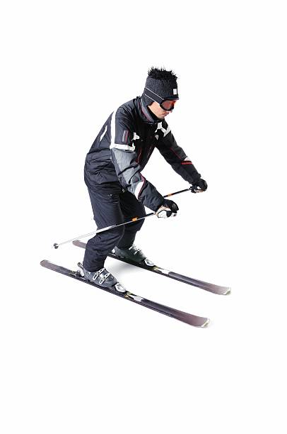 istock One male skier skiing on a white background 477714713