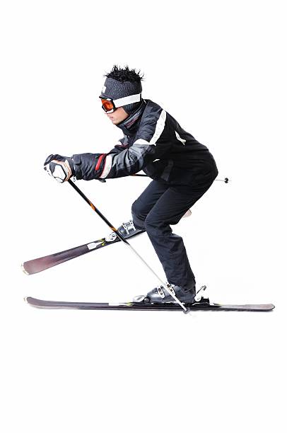 istock One male skier skiing on a white background 477714721