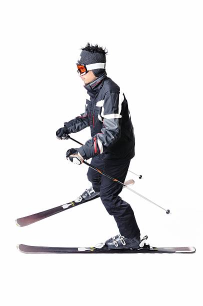 istock One male skier skiing on a white background 477714733
