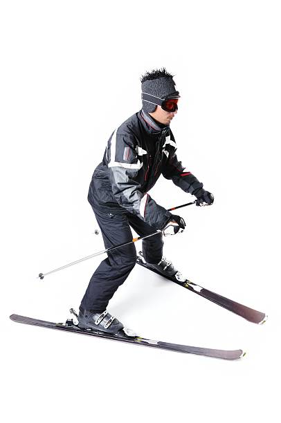istock One male skier skiing on a white background 477714737