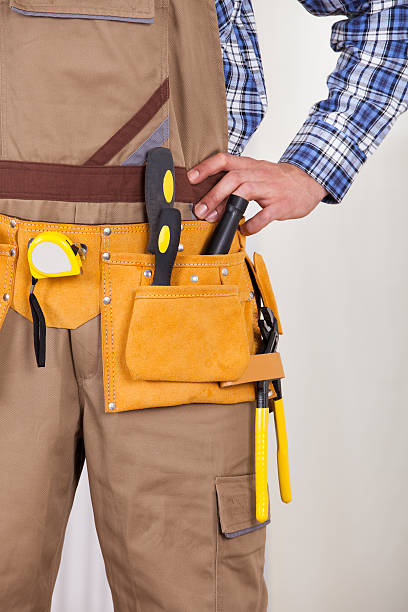 istock Repairman Wearing Tool Belt 477715178
