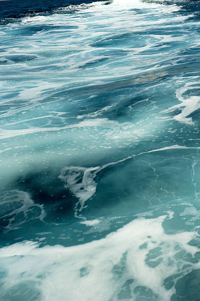 Churning water behind a cruise ship