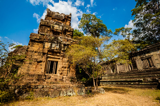 Ankor Wat, Siem Reap, Cambodia-September 6, 2018: Tourists exploring the vast ruins of Ankor Wat temple complex. Cambodia.