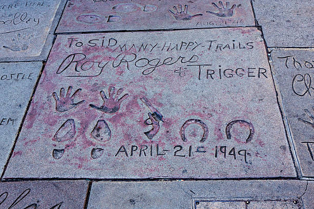 Handprints and Footprints Roy Rogers Chinese Theatre Hollywood Los Angeles, USA - January 17, 2014:  The handprints and footprints of Roy Rogers and his horse Trigger in front of the famous Grauman's Chinese Theatre on Hollywood Boulevard. named animal stock pictures, royalty-free photos & images