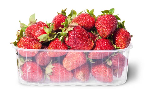 istock Freshly strawberries in a plastic tray 477716118