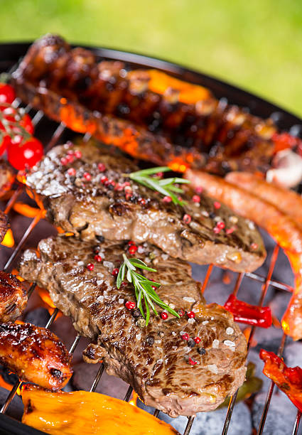 istock Barbecue grill with various kinds of meat 477716514