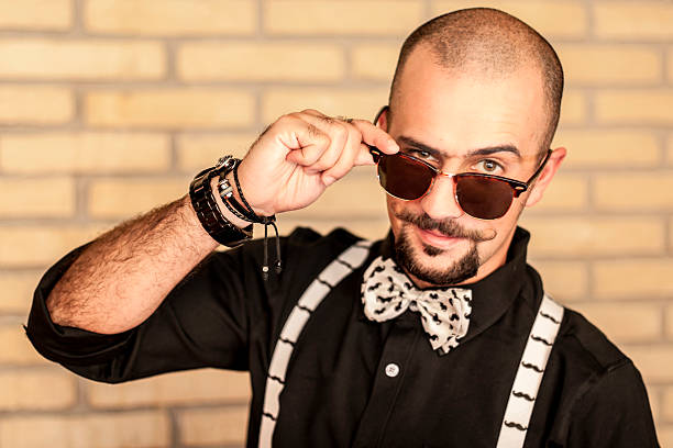 istock Young man looking at the camera over the glasses 477716696