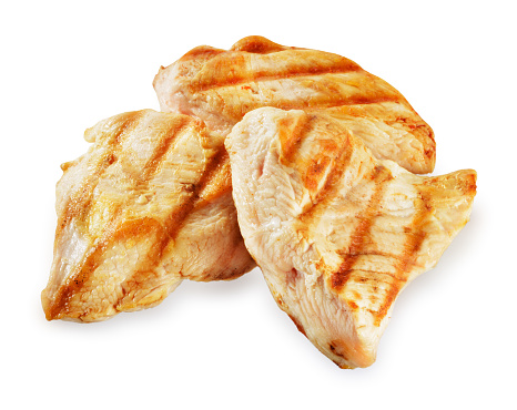 Prepared chicken meat. Breast fillet slices isolated. Clipping path.